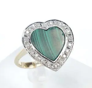 Heart-shaped malachite ring with diamond accents.
