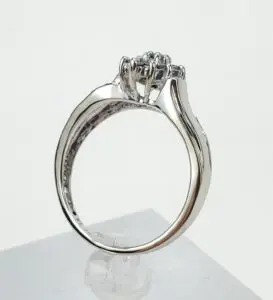 Silver engagement ring with diamond setting.