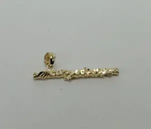 Gold textured pendant on white background.