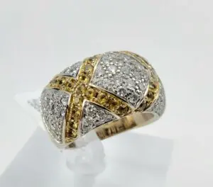 Gold and silver diamond-studded ring.