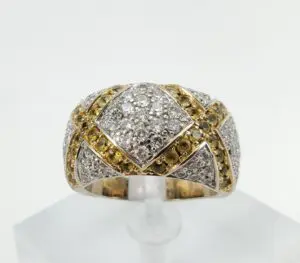 Gold and silver diamond-encrusted ring.