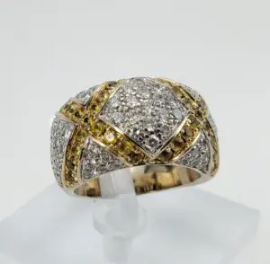 Gold and silver diamond-studded ring.