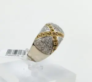 Gold and silver ring with gemstones.