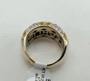 Gold and silver ring with diamonds.