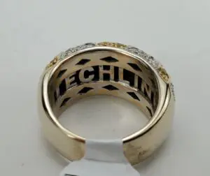 Gold ring with engraved inside text.