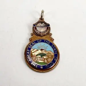 Ohio state seal pendant with fire chiefs emblem.