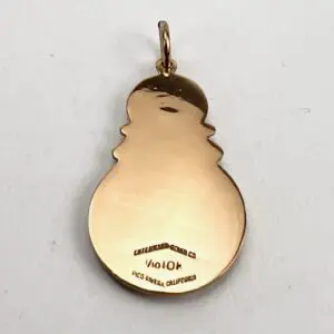 Gold snowman-shaped pendant with engraved text.