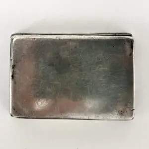 Rectangular silver metal object on white background.