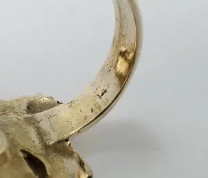 Gold ring with visible hallmark marking.