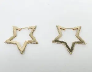 Gold star-shaped hoop earrings.