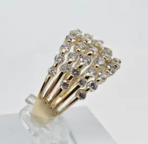 Gold ring with clustered diamond design.