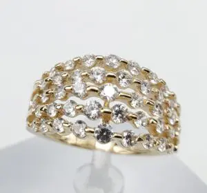 Gold ring with multiple diamond rows.