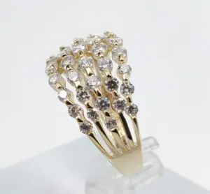 Gold ring with multiple diamonds design.