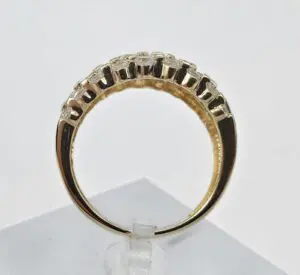 Gold ring with embedded gemstones.