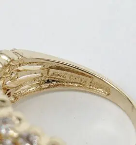 Gold ring with "14K China" engraving.
