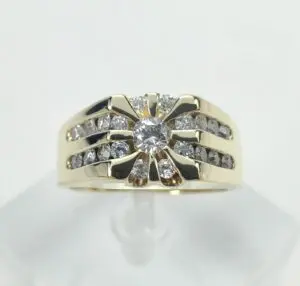 Gold ring with diamonds and central stone.