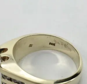 Gold ring with 14K hallmark inside band.