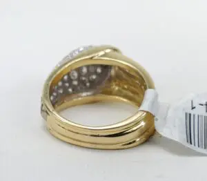 Gold ring with barcode tag attached.