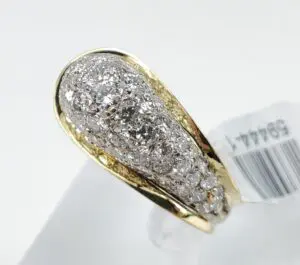 Gold ring with sparkling diamond cluster.