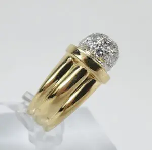 Gold ring with diamond cluster setting.