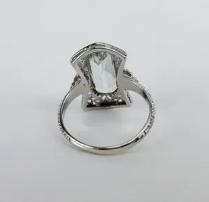 Silver ring with large gemstone, back view.