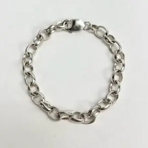 Silver chain bracelet on white background.
