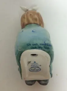Ceramic donkey with "Ooh, My Tooth" inscription.