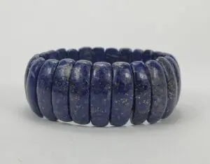 Blue gemstone bracelet with oval beads.