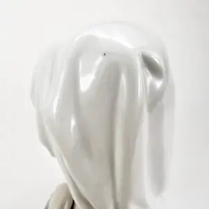 White, shiny dog sculpture from behind.