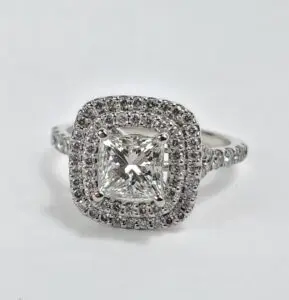 Square diamond ring with double halo setting.