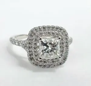 Square diamond ring with double halo setting.
