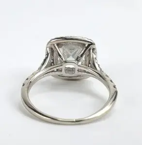 Diamond engagement ring with intricate setting.