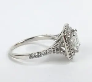 Diamond engagement ring with intricate detailing.