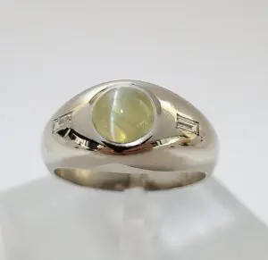 Silver ring with cat's eye gemstone.