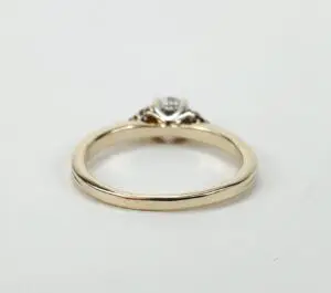 Gold ring with a diamond setting.