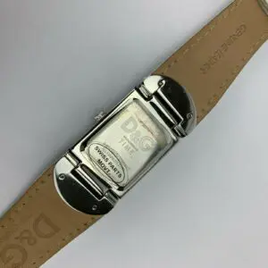 Back of watch with leather strap.