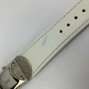 White leather watch strap with buckle.