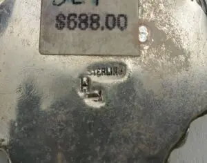 Sterling silver item with price tag.