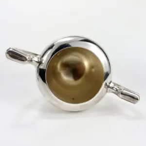 Silver bowl with handles, top view.