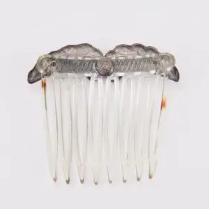 Decorative clear plastic hair comb accessory.
