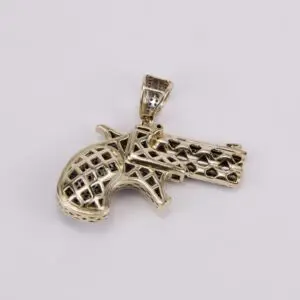 Gold gun-shaped pendant with intricate design.
