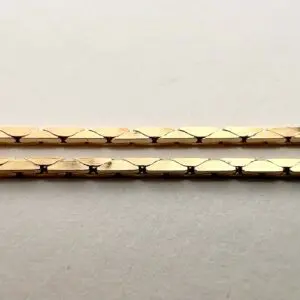 Two gold chains on a white background.
