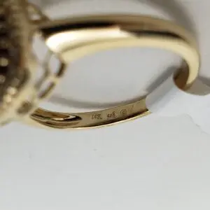 Close-up of a 14K gold ring.