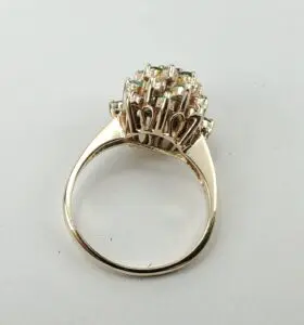 Gold ring with intricate gemstone setting.