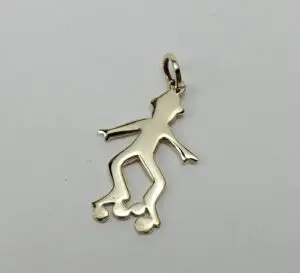 Skating figure pendant with roller skates.