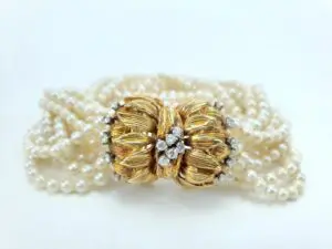 Gold clasp with pearls and diamonds.