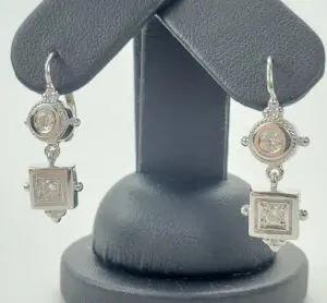 Silver earrings with square and round stones.