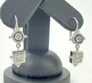 Silver earrings with square and round stones.