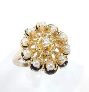 Gold floral ring with pearls and diamond.