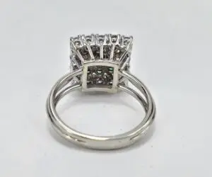 Silver ring with intricate gemstone setting.